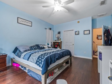 Welcome to this beautifully maintained 3-bedroom, 2-bathroom on Wildwood Country Club in Florida - for sale on GolfHomes.com, golf home, golf lot