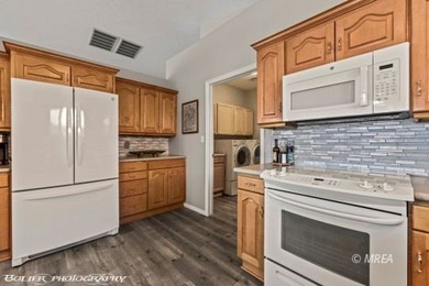 This stunning 3-bedroom, 4-bathroom home nestled on the 18th on The Oasis Golf Club in Nevada - for sale on GolfHomes.com, golf home, golf lot