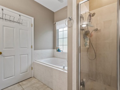 Welcome to this beautifully maintained 3-bedroom, 2-bathroom on Wildwood Country Club in Florida - for sale on GolfHomes.com, golf home, golf lot