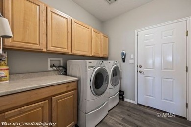 This stunning 3-bedroom, 4-bathroom home nestled on the 18th on The Oasis Golf Club in Nevada - for sale on GolfHomes.com, golf home, golf lot