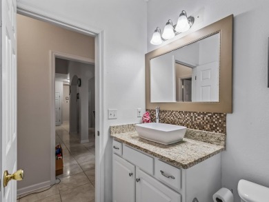 Welcome to this beautifully maintained 3-bedroom, 2-bathroom on Wildwood Country Club in Florida - for sale on GolfHomes.com, golf home, golf lot