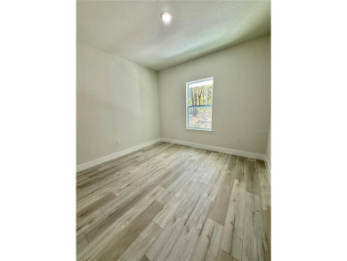 One or more photo(s) has been virtually staged. SPACIOUS NEW on Citrus Springs Country Club in Florida - for sale on GolfHomes.com, golf home, golf lot