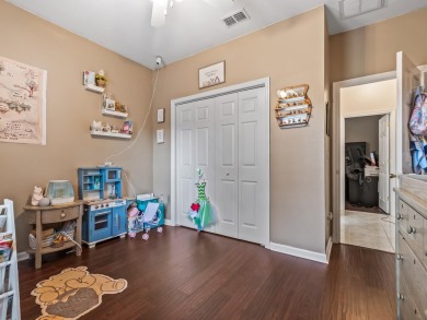 Welcome to this beautifully maintained 3-bedroom, 2-bathroom on Wildwood Country Club in Florida - for sale on GolfHomes.com, golf home, golf lot