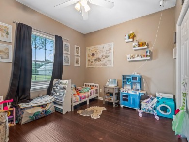 Welcome to this beautifully maintained 3-bedroom, 2-bathroom on Wildwood Country Club in Florida - for sale on GolfHomes.com, golf home, golf lot