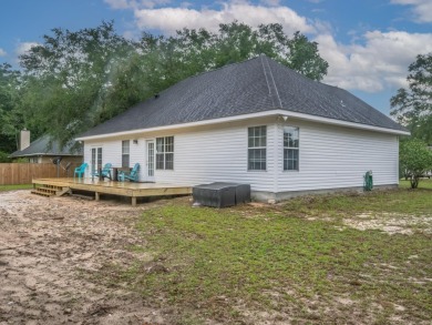 Welcome to this beautifully maintained 3-bedroom, 2-bathroom on Wildwood Country Club in Florida - for sale on GolfHomes.com, golf home, golf lot