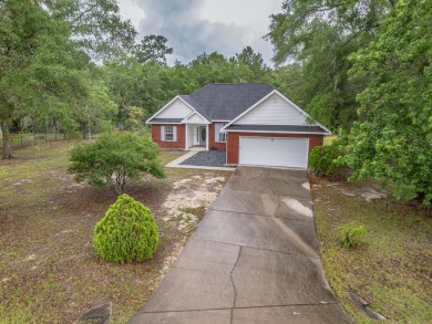 Welcome to this beautifully maintained 3-bedroom, 2-bathroom on Wildwood Country Club in Florida - for sale on GolfHomes.com, golf home, golf lot