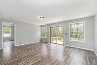 This 3 bedroom, 2 bath ranch backs up to the commons area with a on Sugar Springs Country Club in Michigan - for sale on GolfHomes.com, golf home, golf lot