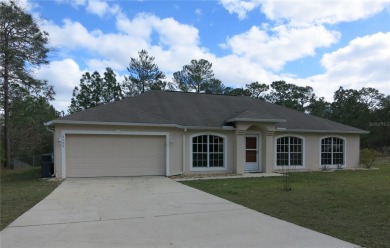 Freshly painted & move-in ready! 4 bedroom, 2 bath home with on Citrus Springs Country Club in Florida - for sale on GolfHomes.com, golf home, golf lot