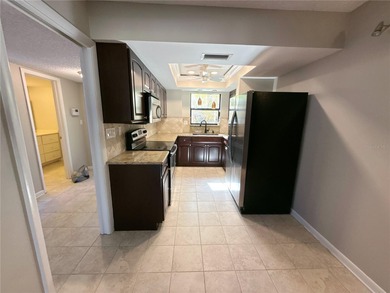 This beautifully updated two-level condo offers the perfect on Carrollwood Country Club in Florida - for sale on GolfHomes.com, golf home, golf lot
