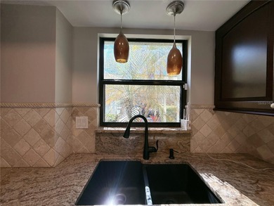 **Seller is willing to cover up to six (6) months of the buyer's on Carrollwood Country Club in Florida - for sale on GolfHomes.com, golf home, golf lot