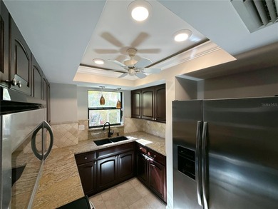 **Seller is willing to cover up to six (6) months of the buyer's on Carrollwood Country Club in Florida - for sale on GolfHomes.com, golf home, golf lot