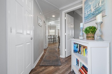 Beautifully renovated 2 bed, 2 bath Beachwalk condo just steps on Sandpiper Cove Golf Course in Florida - for sale on GolfHomes.com, golf home, golf lot