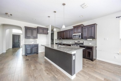 WELCOME HOME! This well-maintained home is located minutes away on The Golf Club At Champions Circle in Texas - for sale on GolfHomes.com, golf home, golf lot