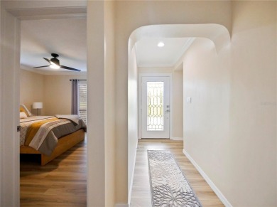 This amazing, meticulously remodeled one-story pool home offers on Rolling Hills Golf Club in Florida - for sale on GolfHomes.com, golf home, golf lot