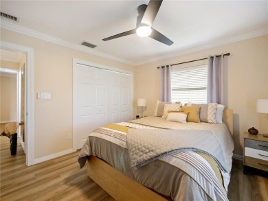 This amazing, meticulously remodeled one-story pool home offers on Rolling Hills Golf Club in Florida - for sale on GolfHomes.com, golf home, golf lot