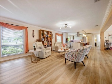 This amazing, meticulously remodeled one-story pool home offers on Rolling Hills Golf Club in Florida - for sale on GolfHomes.com, golf home, golf lot