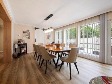 This amazing, meticulously remodeled one-story pool home offers on Rolling Hills Golf Club in Florida - for sale on GolfHomes.com, golf home, golf lot