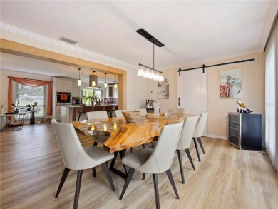 This amazing, meticulously remodeled one-story pool home offers on Rolling Hills Golf Club in Florida - for sale on GolfHomes.com, golf home, golf lot