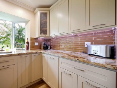 This amazing, meticulously remodeled one-story pool home offers on Rolling Hills Golf Club in Florida - for sale on GolfHomes.com, golf home, golf lot