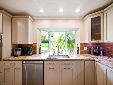 This amazing, meticulously remodeled one-story pool home offers on Rolling Hills Golf Club in Florida - for sale on GolfHomes.com, golf home, golf lot