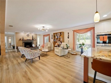 This amazing, meticulously remodeled one-story pool home offers on Rolling Hills Golf Club in Florida - for sale on GolfHomes.com, golf home, golf lot