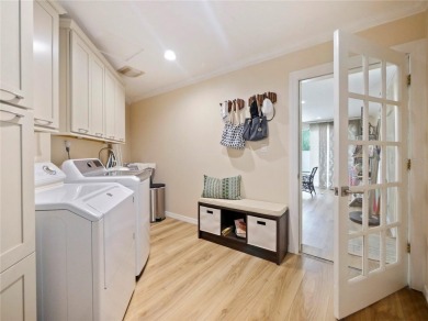 This amazing, meticulously remodeled one-story pool home offers on Rolling Hills Golf Club in Florida - for sale on GolfHomes.com, golf home, golf lot