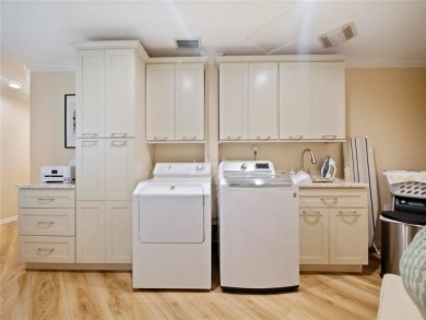 This amazing, meticulously remodeled one-story pool home offers on Rolling Hills Golf Club in Florida - for sale on GolfHomes.com, golf home, golf lot