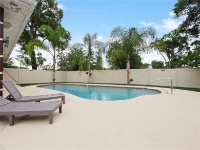 This amazing, meticulously remodeled one-story pool home offers on Rolling Hills Golf Club in Florida - for sale on GolfHomes.com, golf home, golf lot