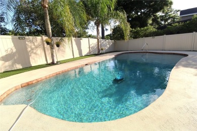 This amazing, meticulously remodeled one-story pool home offers on Rolling Hills Golf Club in Florida - for sale on GolfHomes.com, golf home, golf lot