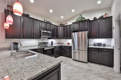 Wake up every day feeling like you're on vacation in this on Tampa Bay Golf and Country Club in Florida - for sale on GolfHomes.com, golf home, golf lot