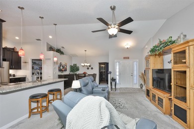 Wake up every day feeling like you're on vacation in this on Tampa Bay Golf and Country Club in Florida - for sale on GolfHomes.com, golf home, golf lot