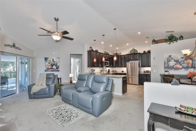 Wake up every day feeling like you're on vacation in this on Tampa Bay Golf and Country Club in Florida - for sale on GolfHomes.com, golf home, golf lot