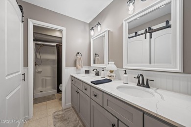 Fresh, bright, and move-in ready--this ground-floor 2BR/2BA on Olde Point Golf and Country Club in North Carolina - for sale on GolfHomes.com, golf home, golf lot