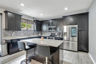 This beautifully updated 5-bedroom, 3-bath home is located in a on Wedgefield Golf Club in Florida - for sale on GolfHomes.com, golf home, golf lot