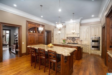 Designed by Atlanta architect Durham Crout, this French Normandy on Shoal Creek Golf Course in Alabama - for sale on GolfHomes.com, golf home, golf lot