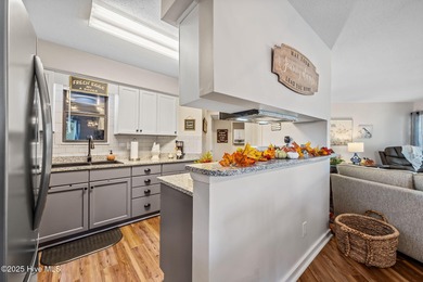 Fresh, bright, and move-in ready--this ground-floor 2BR/2BA on Olde Point Golf and Country Club in North Carolina - for sale on GolfHomes.com, golf home, golf lot