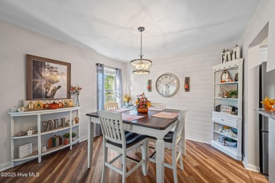 Fresh, bright, and move-in ready--this ground-floor 2BR/2BA on Olde Point Golf and Country Club in North Carolina - for sale on GolfHomes.com, golf home, golf lot