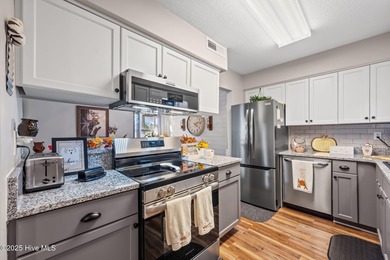 Fresh, bright, and move-in ready--this ground-floor 2BR/2BA on Olde Point Golf and Country Club in North Carolina - for sale on GolfHomes.com, golf home, golf lot
