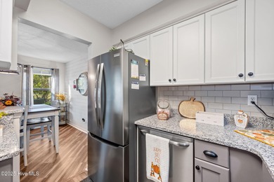 Fresh, bright, and move-in ready--this ground-floor 2BR/2BA on Olde Point Golf and Country Club in North Carolina - for sale on GolfHomes.com, golf home, golf lot