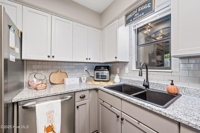 Fresh, bright, and move-in ready--this ground-floor 2BR/2BA on Olde Point Golf and Country Club in North Carolina - for sale on GolfHomes.com, golf home, golf lot