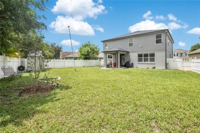 This beautifully updated 5-bedroom, 3-bath home is located in a on Wedgefield Golf Club in Florida - for sale on GolfHomes.com, golf home, golf lot