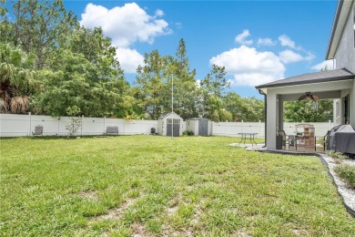 This beautifully updated 5-bedroom, 3-bath home is located in a on Wedgefield Golf Club in Florida - for sale on GolfHomes.com, golf home, golf lot
