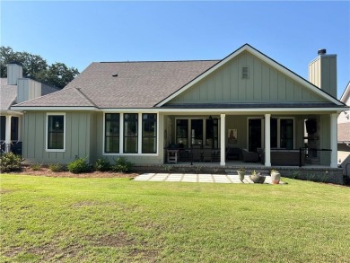 Welcome to this stunning one story cottage-style home nestled in on Lakewood Golf Club in Alabama - for sale on GolfHomes.com, golf home, golf lot