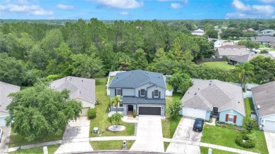 This beautifully updated 5-bedroom, 3-bath home is located in a on Wedgefield Golf Club in Florida - for sale on GolfHomes.com, golf home, golf lot