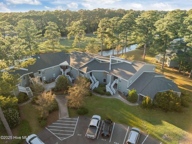 Fresh, bright, and move-in ready--this ground-floor 2BR/2BA on Olde Point Golf and Country Club in North Carolina - for sale on GolfHomes.com, golf home, golf lot