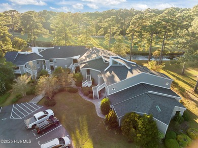 Fresh, bright, and move-in ready--this ground-floor 2BR/2BA on Olde Point Golf and Country Club in North Carolina - for sale on GolfHomes.com, golf home, golf lot