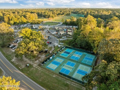 Fresh, bright, and move-in ready--this ground-floor 2BR/2BA on Olde Point Golf and Country Club in North Carolina - for sale on GolfHomes.com, golf home, golf lot