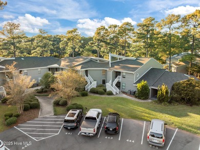 Fresh, bright, and move-in ready--this ground-floor 2BR/2BA on Olde Point Golf and Country Club in North Carolina - for sale on GolfHomes.com, golf home, golf lot