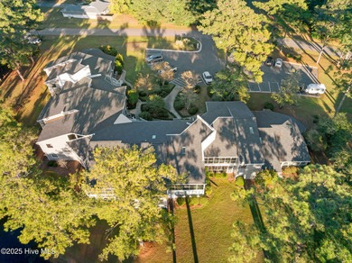 Fresh, bright, and move-in ready--this ground-floor 2BR/2BA on Olde Point Golf and Country Club in North Carolina - for sale on GolfHomes.com, golf home, golf lot