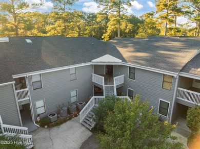 Fresh, bright, and move-in ready--this ground-floor 2BR/2BA on Olde Point Golf and Country Club in North Carolina - for sale on GolfHomes.com, golf home, golf lot